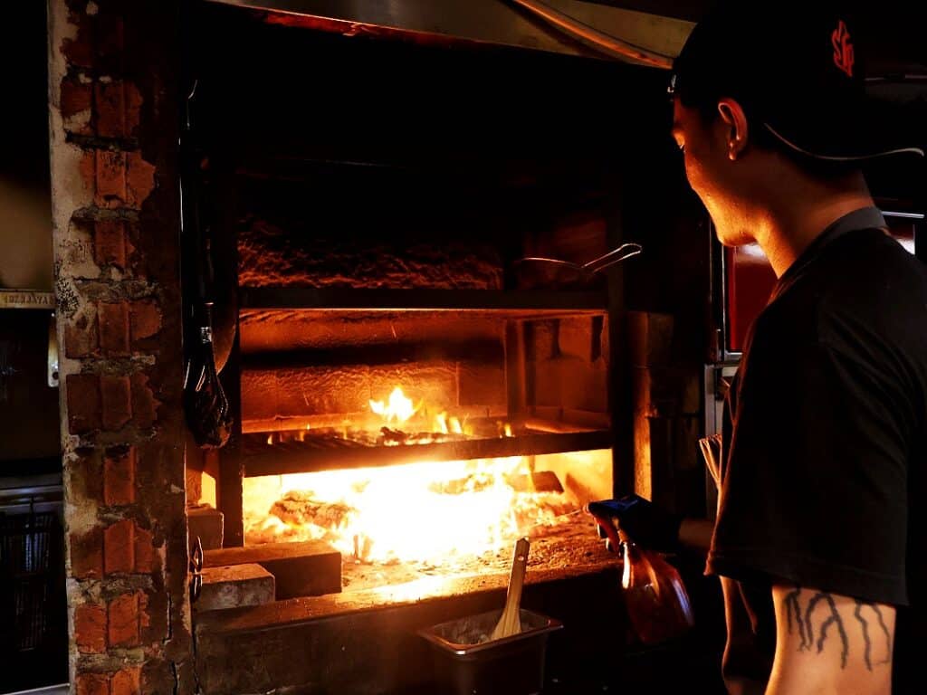 firepitz open flame charcoal grilled steak
